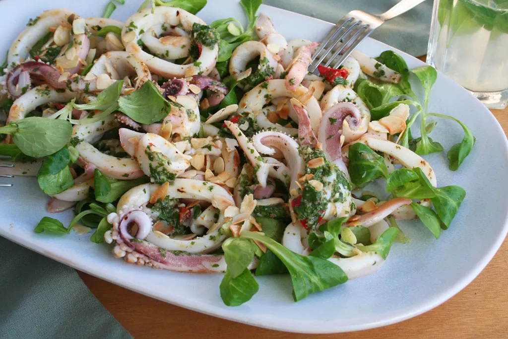 Squid, Padrón Peppers, and Almonds: A Flavorful Combo