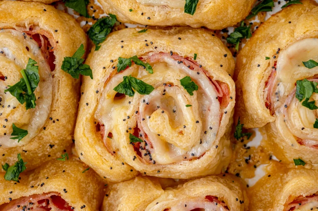 How to Make Manchego and XO-Poppyseed Pinwheels
