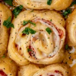 How to Make Manchego and XO-Poppyseed Pinwheels
