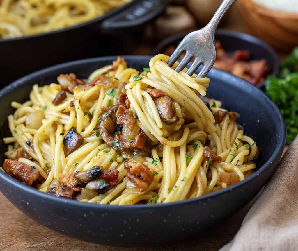 Ancho Mushroom Linguine With Onions and Chard